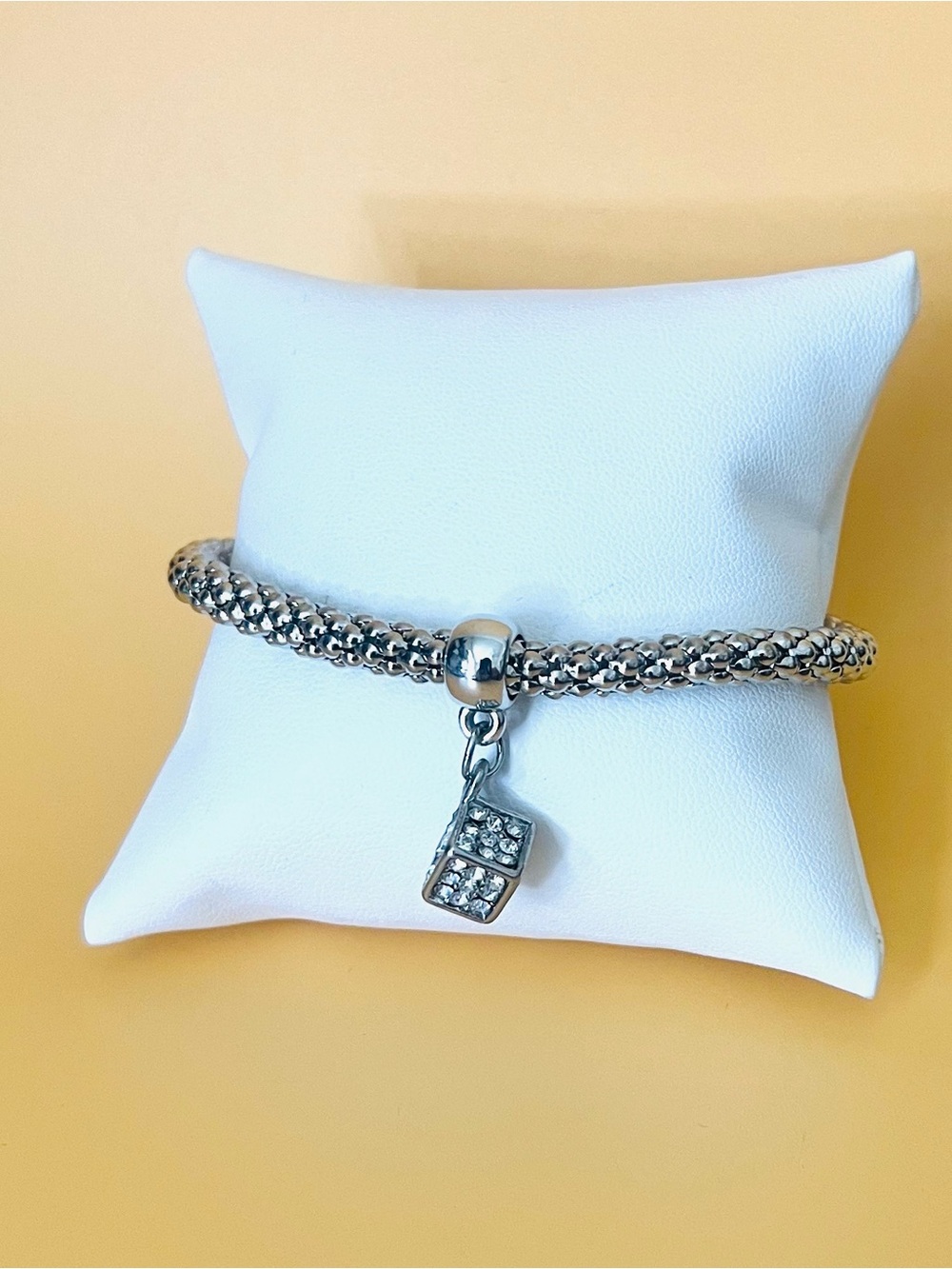 Stainless steel stretchy bracelet with paved  clear CZ cube Charm